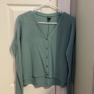 A teal long sleeve top in a size XS